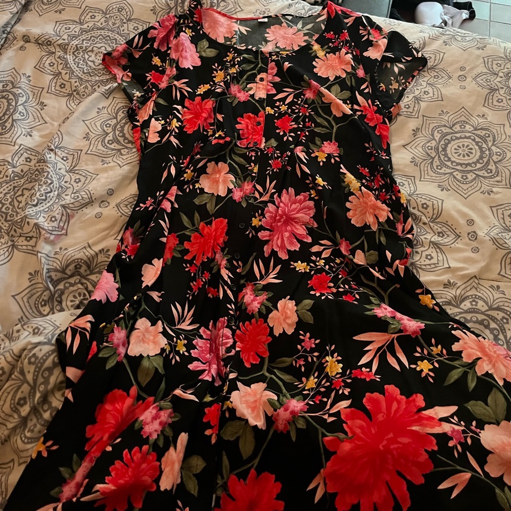 A cute floral button up dress